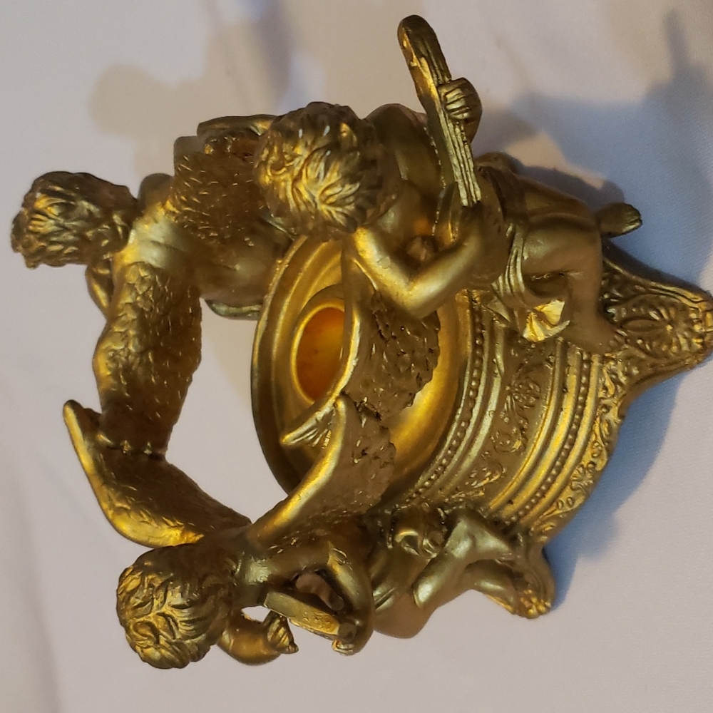 A Telaflora Gift Gold Cherub Single Candle Holder